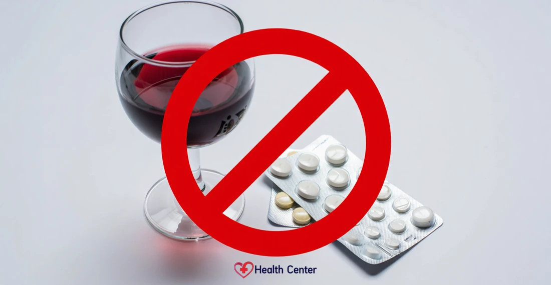 Бокал вина и таблетки перечеркнуты красным знаком запрета